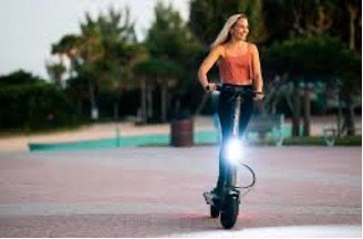 Woman riding an electronic scooter